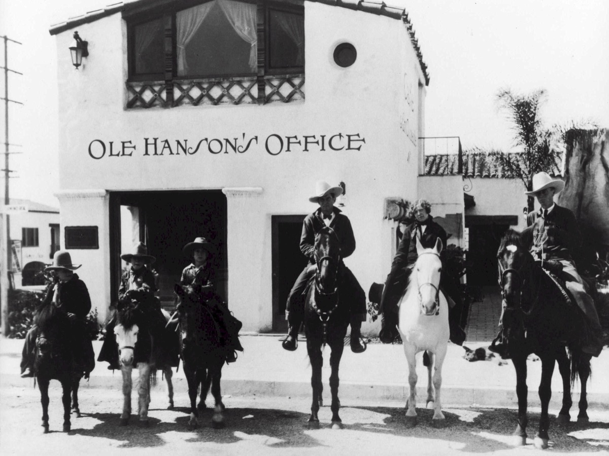 Ole Hanson's office with men on horseback